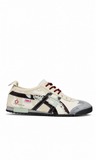 Onitsuka Tiger Mexico 66 con un patrón de camuflaje beige y detalles gráficos en negro y rojo - Calzado de mujer y hombre