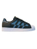 Adidas Superstar en color negro con detalles reflectivos azules - Calzado de mujer y hombre