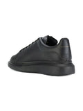 Alexander McQueen tenis con suela ancha negro total