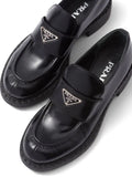 N374O Prada
mocasines con placa del logo - Calzado de mujer y hombre