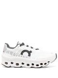 On Running tenis Cloudmonster blanco negro