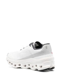 On Running tenis Cloudmonster blanco negro
