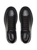 Alexander McQueen tenis mid-top con suela transparente - Calzado de mujer y hombre