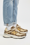 New Balance 9060 en una combinación de colores beige y marrón con un audaz estampado de leopardo - Calzado de mujer y hombre