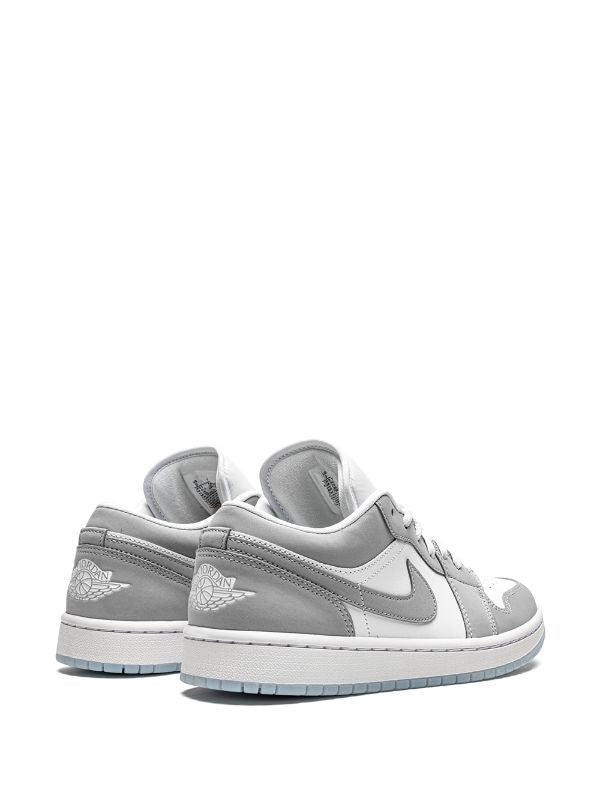 JORDAN 1 LOW BLANCO GRIS
